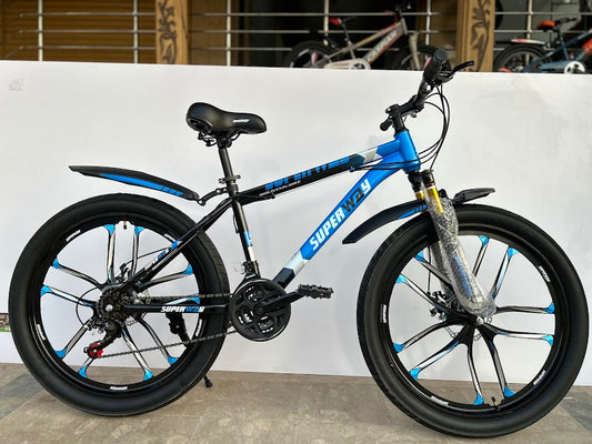 26” Premium Mountain Bike with Fiber Star Rims & Gears – Wide Tires, Lock Shocks – Cyclistan.pk